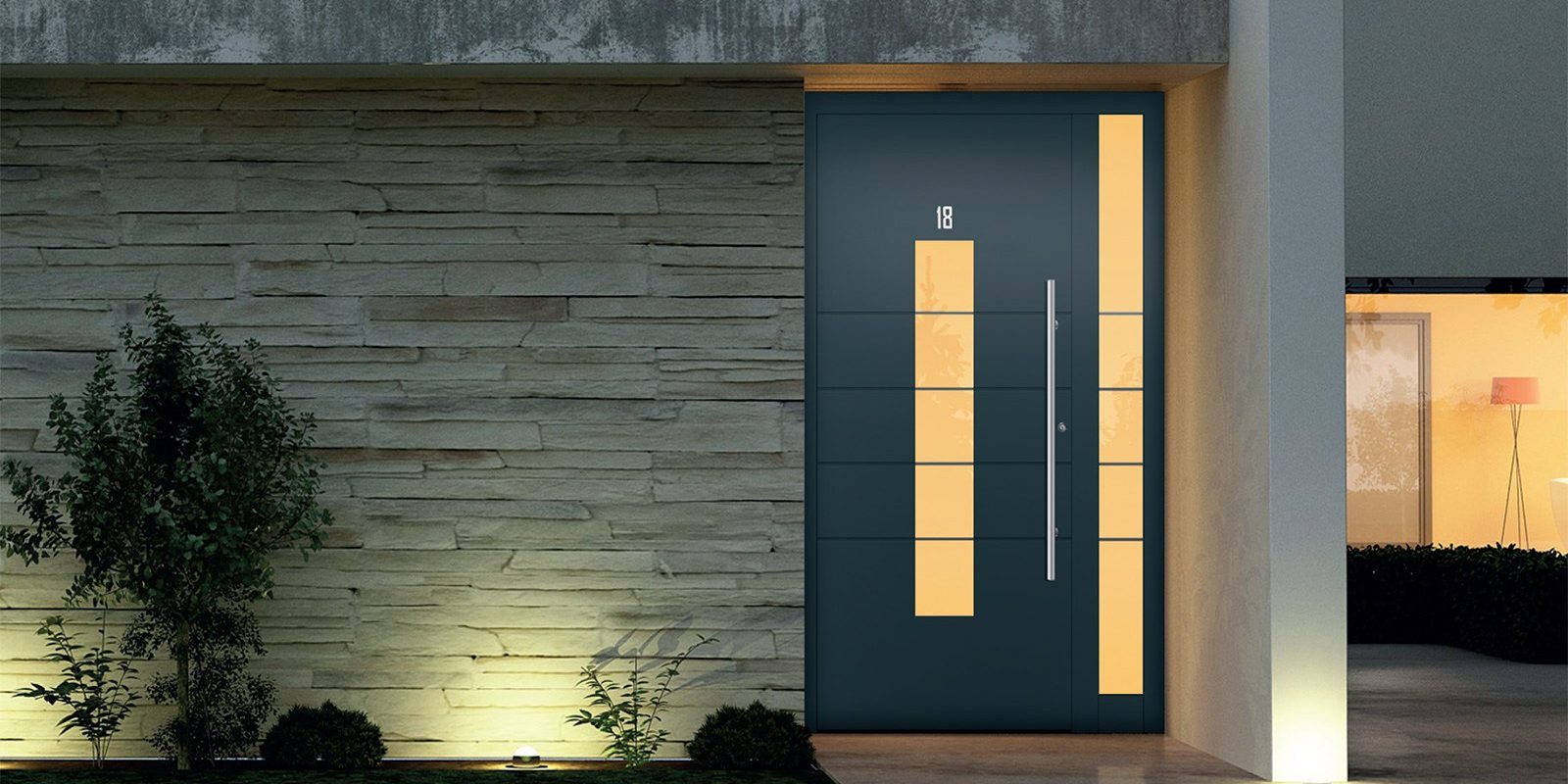 pintu-alumunium-dengan-tulisan-metal-pada-rumah-dengan-dinding-batu-alam